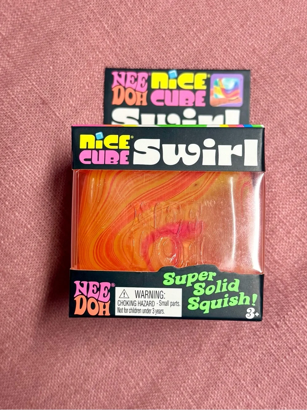 Needoh Nice Cube Swirl Super Solid Squish - Orange/Pink